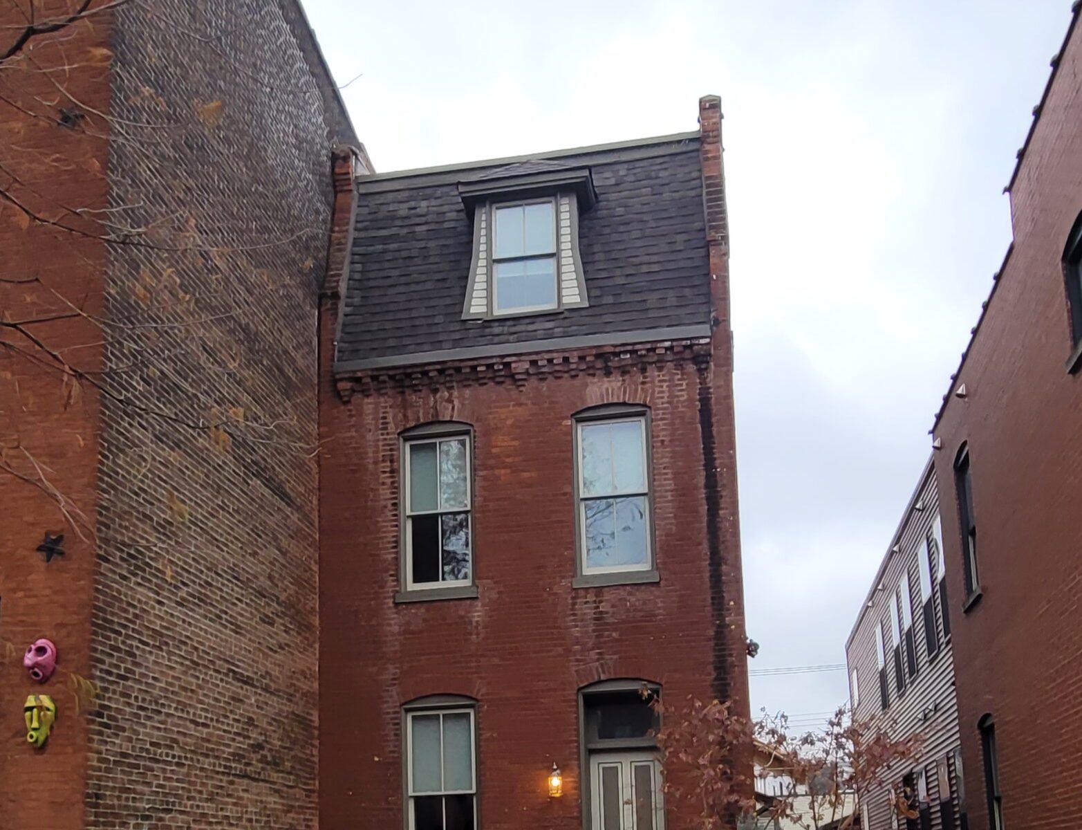 A small brick two story home